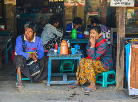 Yangon, Myanmar - Feb 1, 2017. People drink coffee on street in Yangon, Myanmar. Yangon is Myanmar largest city and its most important commercial centre.のeditorial素材
