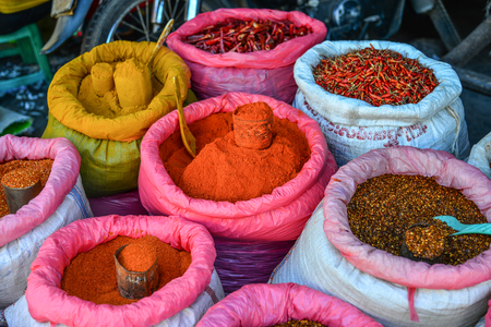 Colored spices at local market in Yangon, Myanmar.のeditorial素材