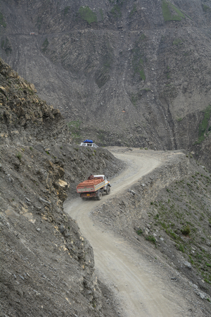 Srinagar, India - Jul 2, 2015. Cars run on dangerous mountain road in Srinagar, India. Srinagar is the largest city and the summer capital of Jammu and Kashmir.のeditorial素材