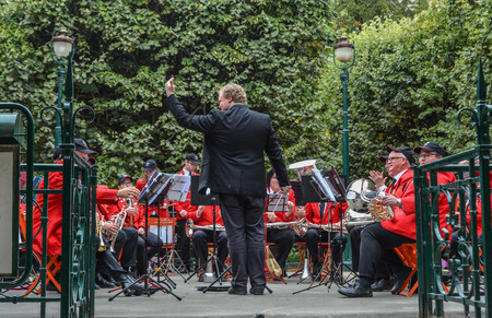 Paris, France - Oct 2, 2018. Conductor with musicians of Sydney Symphony Orchestra perform at public park near Notre-Dame de Paris.のeditorial素材