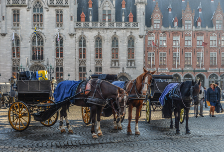 Bruges, Belgium - Oct 6, 2018. Carriage pulled by a horse at the beautiful Bruges town, Belgium.のeditorial素材
