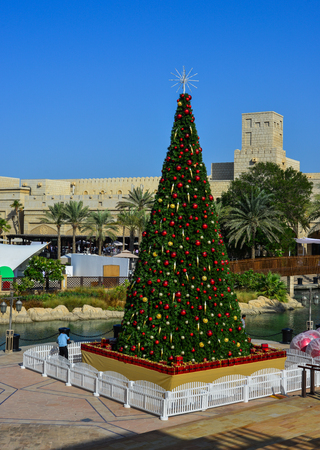Dubai, UAE - Dec 9, 2018. Huge Christmas tree on square of Madinat Jumeirah in Dubai, UAE. Dubai got ranked 7th world most visited cities in 2009.のeditorial素材
