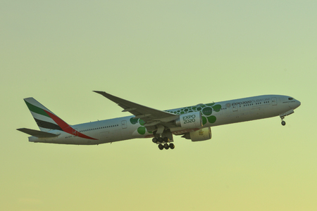 Dubai, UAE - Dec 9, 2018. A Boeing 777-300ER airplane of Emirates taking-off from Dubai Airport (DXB). DXB is the third-busiest airport in the world.のeditorial素材