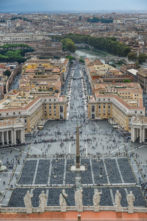 Vatican - Oct 16, 2018. Looking down panorama view over Saint Peter Square (Piazza San Pietro) and Rome City, from St. Peter Basilica dome.のeditorial素材