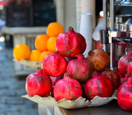 Several pomegranates in basket on the street for juice making in Mtskheta, Georgia.の写真素材