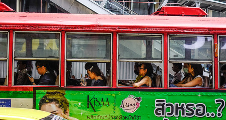 Bangkok, Thailand - Dec 25, 2018. People on the local bus in Bangkok, Thailand. Annually an estimated 150,000 new cars join the already heavily congested streets of Bangkok.のeditorial素材
