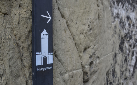 Lucerne, Switzerland - Oct 23, 2018. Sugnboard of Museggmauer in Lucerne. The Musegg wall with its nine towers is part of the ramparts built in the 14th century.のeditorial素材