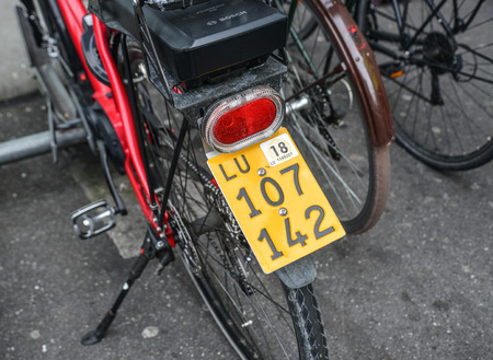 Lucerne, Switzerland - Oct 23, 2018. Bicycles parked on the city street in Lucerne (Luzern), Switzerland.のeditorial素材
