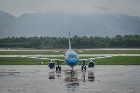 Da Nang, Vietnam - Jul 23, 2018. An Airbus A321 airplane of Vietnam Airlines taxiing on runway of Da Nang International Airport (DAD).のeditorial素材