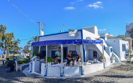 Santorini, Greece - Oct 4, 2018. Local restaurant on Santorini Island. Santorini is one of the most popular islands for destination weddings and honeymoons.のeditorial素材