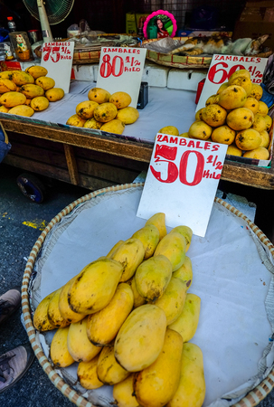 Manila, Philippines - Apr 12, 2017. Fresh mango fruits for sale at street market in Manila, Philippines.のeditorial素材