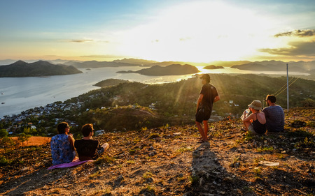 Coron, Philippines - Apr 8, 2017. Enjoying sunset on the sea of Coron Island, from a viewpoint on the hill.のeditorial素材