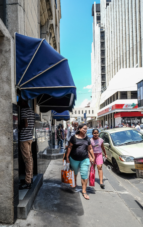Port Louis, Mauritius - Jan 4, 2017. People walking on street of Port Louis, Mauritius. Port Louis is the country economic, cultural and political centre.のeditorial素材