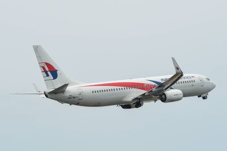 Phuket, Thailand - Apr 25, 2018. A Boeing 737-800 airplane of Malaysia Airlines taking off from...