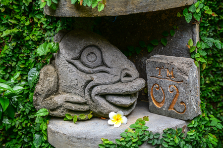 Bali, Indonesia - Apr 20, 2016. Stone statue for decoration at resort garden in Bali, Indonesia.のeditorial素材