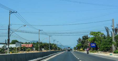 Nha Trang, Vietnam - Mar 20, 2016. Highway at summer day in Nha Trang, Vietnam. The total length of the Vietnam road system is about 222,179 km.のeditorial素材