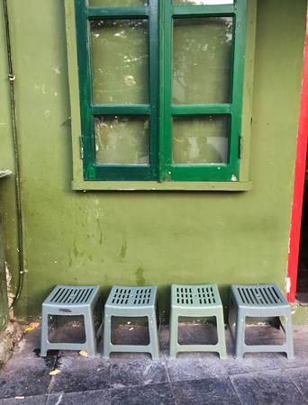 Chairs of coffee shop on the street in Hanoi, Vietnam.の写真素材
