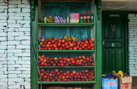 Tadapani, Nepal - Oct 21, 2017. Grocery store with apple fruits at mountain village at base camp path of Annapurna Massif, Nepal.のeditorial素材