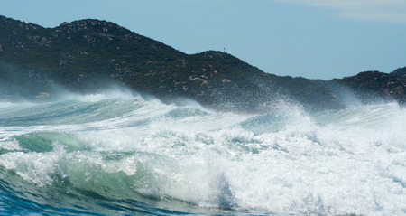 Huge wave on the blue sea at sunny day in Southern Vietnam.