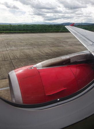 Turbojet engine of the passenger airplane, view from the window of airplane.の写真素材