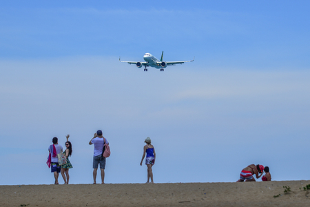 Phuket, Thailand - Apr 4, 2019. An Airbus A320 NEO airplane of Spring Airlines (B-307N) landing above the beach at Phuket Airport (HKT).の写真素材