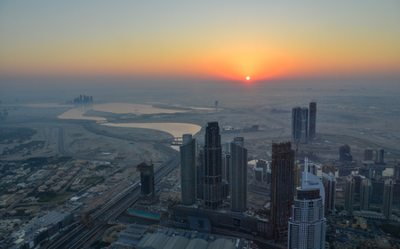 Dubai, UAE - Dec 7, 2018. Aerial view of Dubai City at sunrise. View on the rooftop of Burj Khalifa Building.のeditorial素材