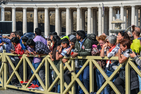 Vatican - Oct 14, 2018. People visit St. Peter Square (Vatican). St. Peter Square is one of the largest and most beautiful squares in the world.のeditorial素材