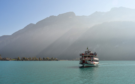 Brienz, Switzerland - Oct 21, 2018. Tourist ferry on the lake in Brienz, Switzerland. The turquoise Lake Brienz is set amid the spectacular mountain scenery.のeditorial素材