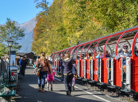 Brienz, Switzerland - Oct 21, 2018. Swiss train stopping at station in Brienz, Switzerland. The first Swiss railway line opened from Zurich to Baden in 1847.のeditorial素材