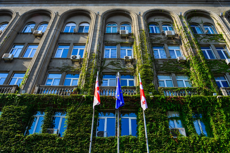 Tbilisi, Georgia - Sep 22, 2018. Government building with flags of Tbilisi, Georgia. Tbilisi is the historic old town, attracting millions of visitors every year.のeditorial素材