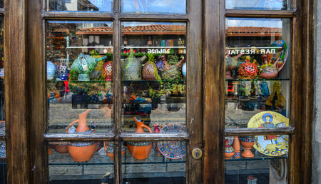 Tbilisi, Georgia - Sep 22, 2018. Glass window of souvenir shop in Tbilisi, Georgia. Tbilisi is a city with a long history, attracting millions of visitors every year.のeditorial素材