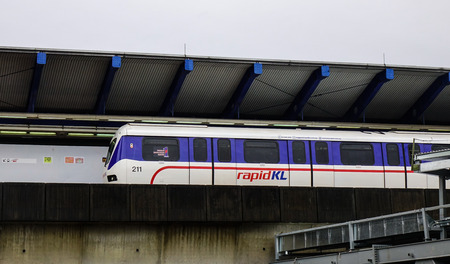 Kuala Lumpur, Malaysia - Nov 14, 2017. Metro train coming to the station in Kuala Lumpur, Malaysia....