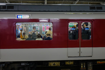 Osaka, Japan - Apr 18, 2019. Train stopping at railway station in Osaka, Japan. Trains are a very...