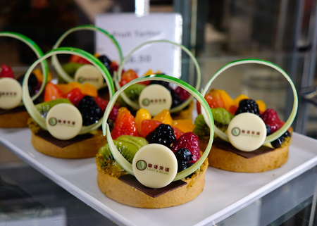 Shanghai, China - Jun 4, 2019. Sweet table at buffet restaurant of Spectrum of the Seas cruise ship by Royal Caribbean.のeditorial素材
