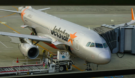 Osaka, Japan - Apr 19, 2019. JA15JJ Jetstar Japan Airbus A320 docking at Kansai Airport (KIX). The airport located on an artificial island of Osaka Bay.のeditorial素材