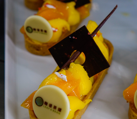 Shanghai, China - Jun 4, 2019. Sweet table at buffet restaurant of Spectrum of the Seas cruise ship by Royal Caribbean.のeditorial素材