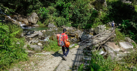 Khopra, Nepal - Oct 22, 2017. Trekking trail of Annapurna Circuit Trek. Numerous other peaks of 6000-8000m in elevation rise from the Annapurna range.のeditorial素材