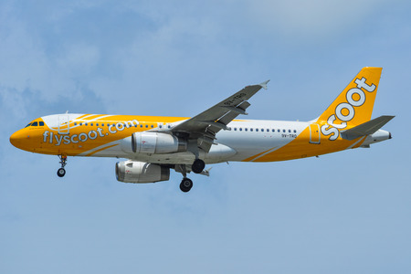 Singapore - Mar 26, 2019. 9V-TRO Scoot A320 landing at Changi Airport (SIN). Changi hits record 65 million passengers in 2018.のeditorial素材