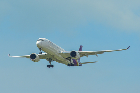 Singapore - Mar 26, 2019. Thai Airways HS-THH (A350-900) landing at Changi Airport (SIN). Changi hits record 65 million passengers in 2018.のeditorial素材