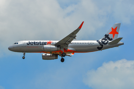 Singapore - Mar 26, 2019. Jetstar Asia 9V-JSS (Airbus A320) landing at Changi Airport (SIN). Changi hits record 65 million passengers in 2018.のeditorial素材