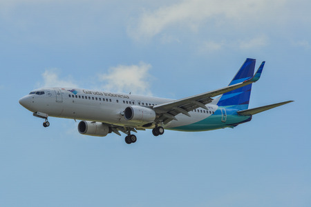 Singapore - Mar 26, 2019. PK-GFG Garuda Indonesia Boeing 737-800 landing at Changi Airport (SIN). Changi hits record 65 million passengers in 2018.のeditorial素材