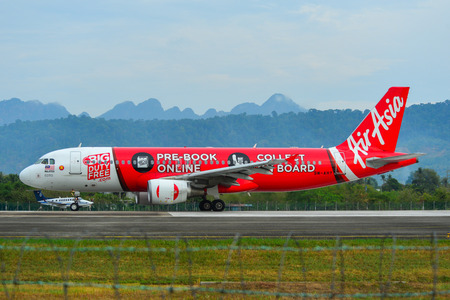Langkawi, Malaysia - Mar 30, 2019. 9M-AHY AirAsia Airbus A320 (BIG Duty Free Livery) taxiing on runway of Langkawi Airport (LGK).のeditorial素材