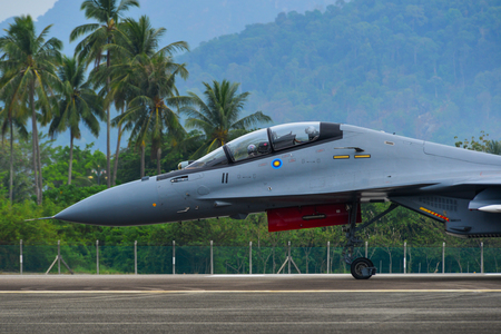 Langkawi, Malaysia - Mar 30, 2019. Royal Malaysian Air Force (TUDM M52-11) Sukhoi SU-30 MKM taxiing on runway of Langkawi Airport (LGK).のeditorial素材