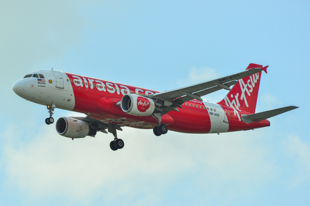 Singapore - Mar 26, 2019. AirAsia 9M-AHS (Airbus A320) landing at Changi Airport (SIN). Changi hits record 65 million passengers in 2018.のeditorial素材