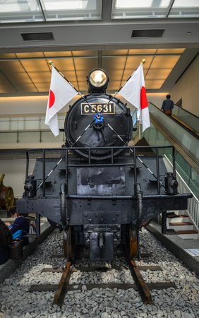 Tokyo, Japan - Apr 7, 2019. A vintage train at the Yushukan Military and War Museum in Yasukuni Shrine.のeditorial素材