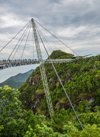Langkawi, Malaysia - Apr 30, 2018. Sky Bridge on mountain and tropical forests in the background Langkawi Island, Malaysia.のeditorial素材