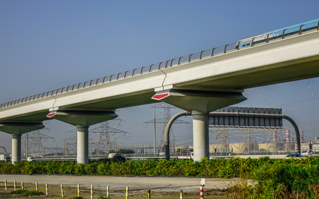 Dubai, UAE - Dec 6, 2018. Sky train railway bridge in Dubai, UAE. Until 2016, the Dubai Metro was the world longest driverless metro network (75 kilometres).のeditorial素材