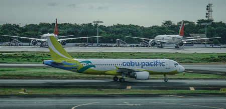 Manila, Philippines - Dec 4, 2018. An A320 airplane of Cebu Pacific taxiing on runway of Manila NAIA Airport (MNL).のeditorial素材