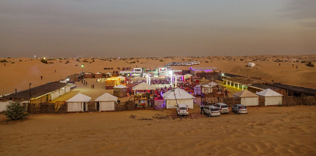 Dubai, UAE - Dec 5, 2018. Bedouin camp on the Dubai desert at sunset. Camping is one of the attractive nightlife in Dubai.のeditorial素材