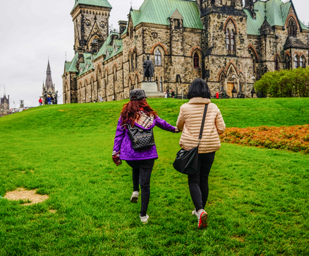 Ottawa, Canada - May 14, 2017. Asian women visiting the Parliament Buildings in Ottawa, Canada.のeditorial素材